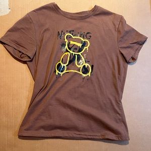 BRAND NEW!!! brown T-shirt with a yellow outline of a bear and black letters